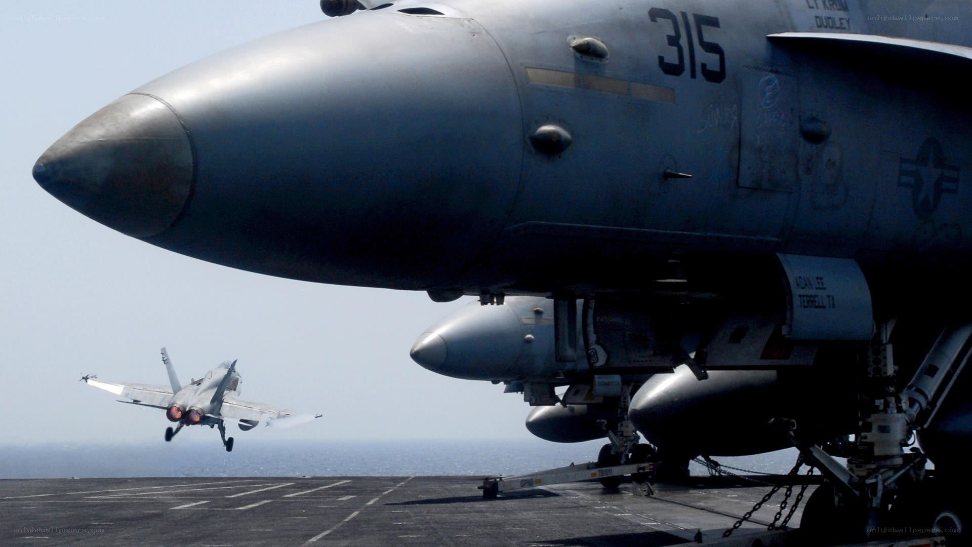 Fighter jet on aircraft carrier deck