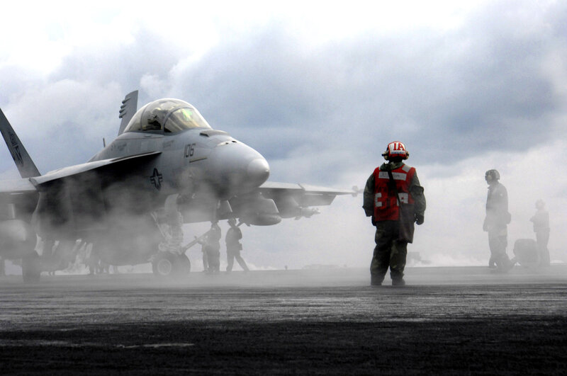 Fighter Jet on Aircraft Carrier — Gray, Dramatic, Photograph, Military Personnel