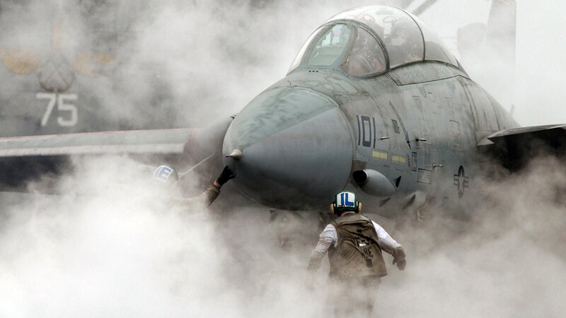 Fighter Jet on Aircraft Carrier — Gray, Dramatic, Photograph, Smoke, Crew