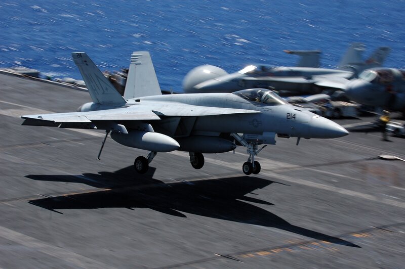 Fighter Jet on Aircraft Carrier — Gray, Dynamic, Afternoon, Photograph, Aircraft Carrier, Ocean, Crew