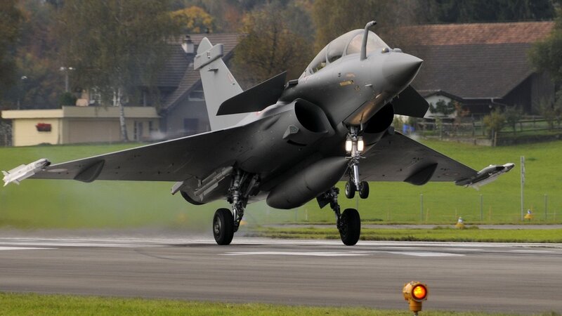 Fighter Jet on Runway — Gray, Dramatic, Afternoon, Photograph, Buildings