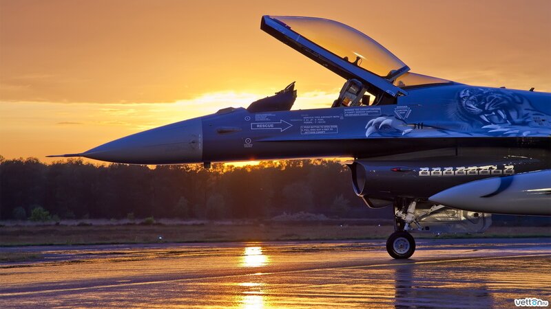 Fighter Jet on Runway — Orange, Dramatic