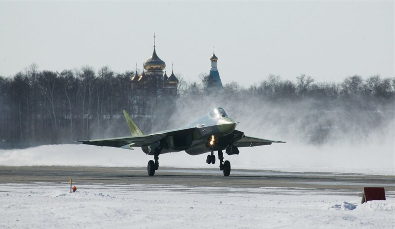 Fighter jet on snowy runway