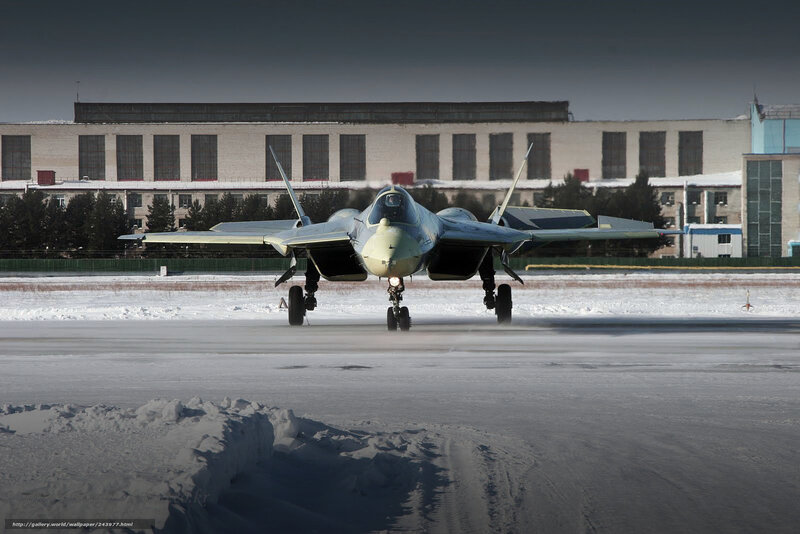 fighter jet on snowy runway