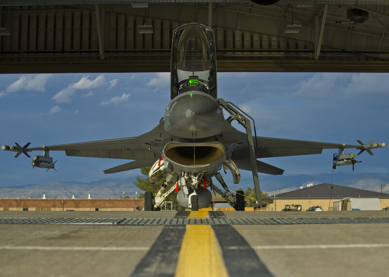 Fighter Jet on Tarmac — Gray, Dramatic, Afternoon, Photograph, Aircraft