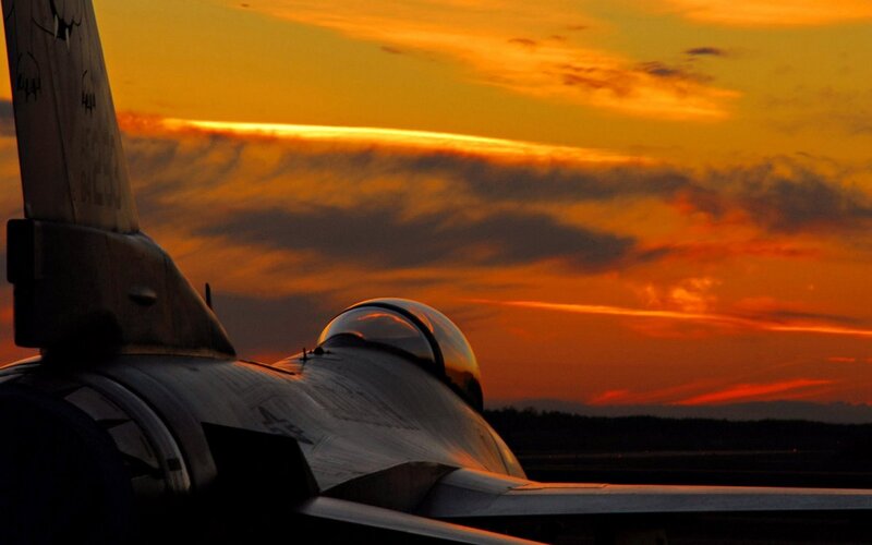 Fighter Jet on Tarmac — Orange, Dramatic