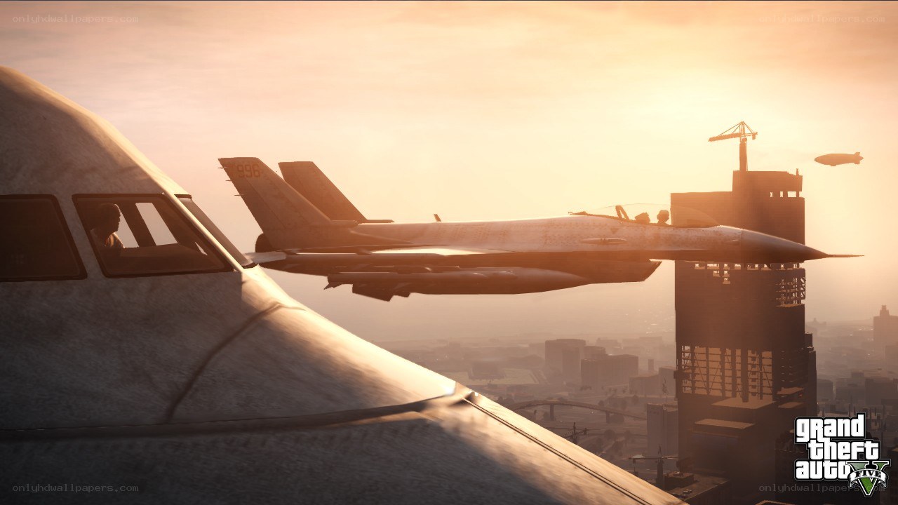 Fighter jet over city at sunset