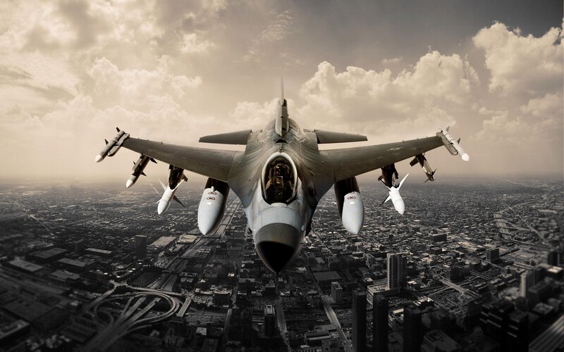 Fighter Jet over City — Gray, Dramatic, Afternoon, Photograph, Missiles, Clouds