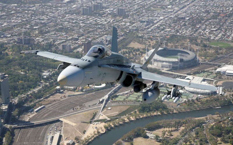 Fighter Jet over City — Gray, Dynamic