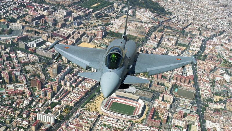Fighter Jet over City — Gray