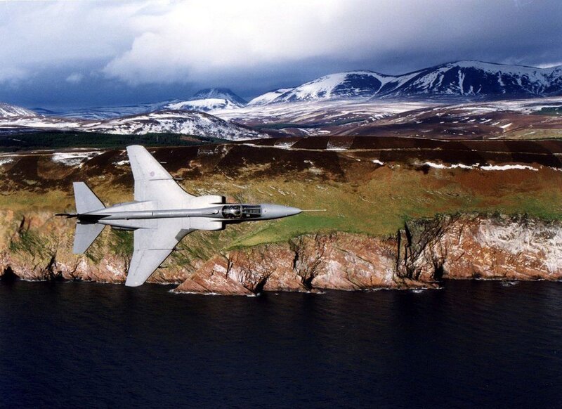 Fighter Jet over Coastline