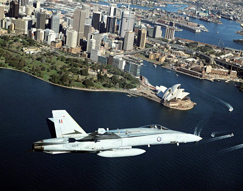 Fighter Jet over Harbor