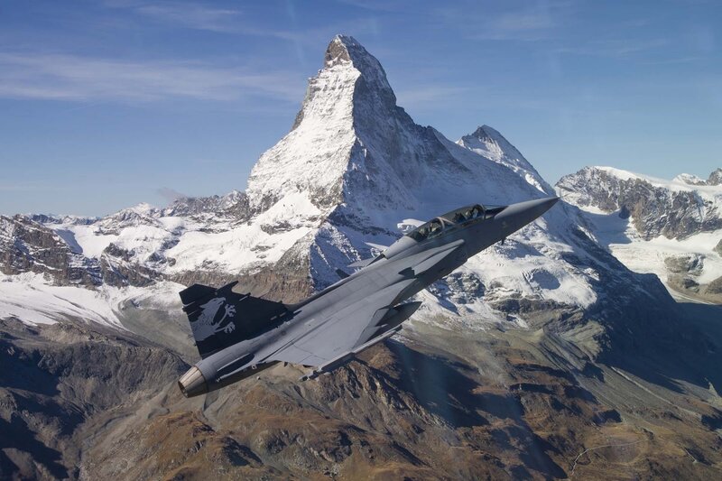 Fighter Jet over Mountain