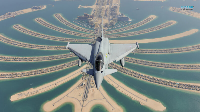 Fighter Jet over Palm Island — Gray, Aerial, Afternoon