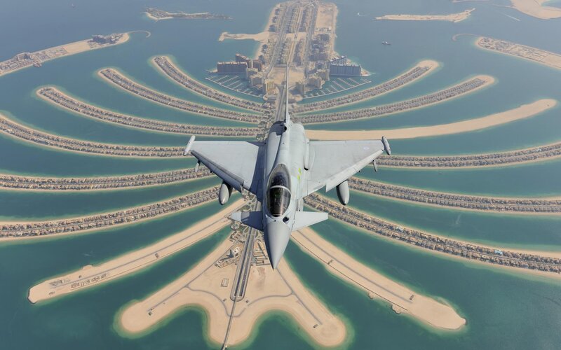 Fighter Jet over Palm Island — Gray, Aerial