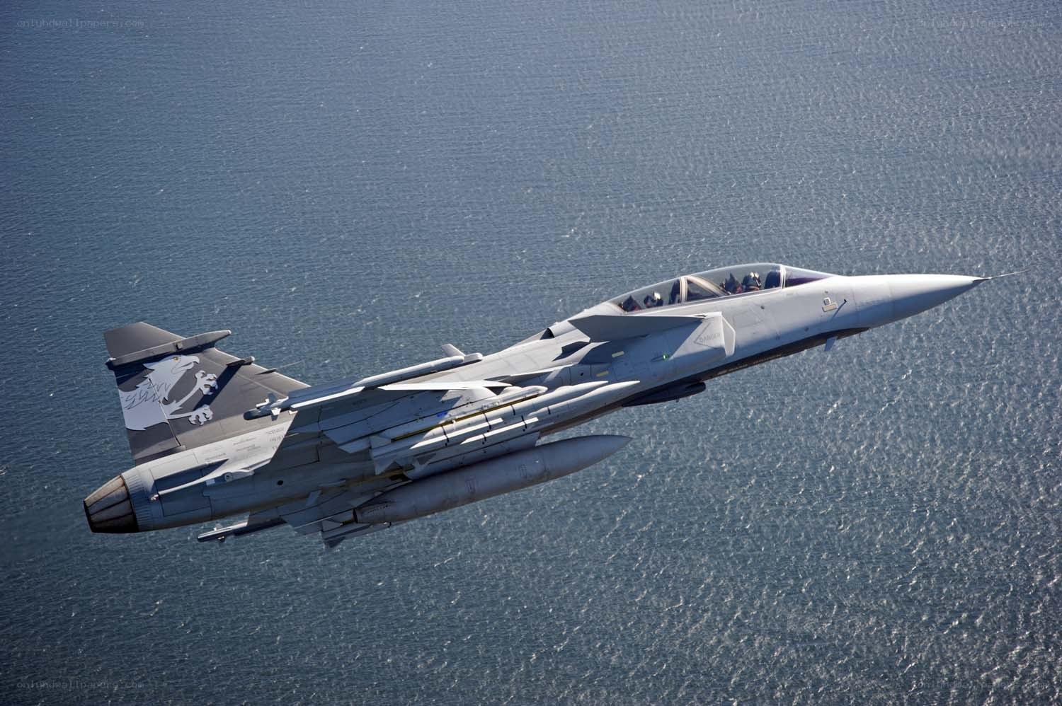 fighter jet over the sea
