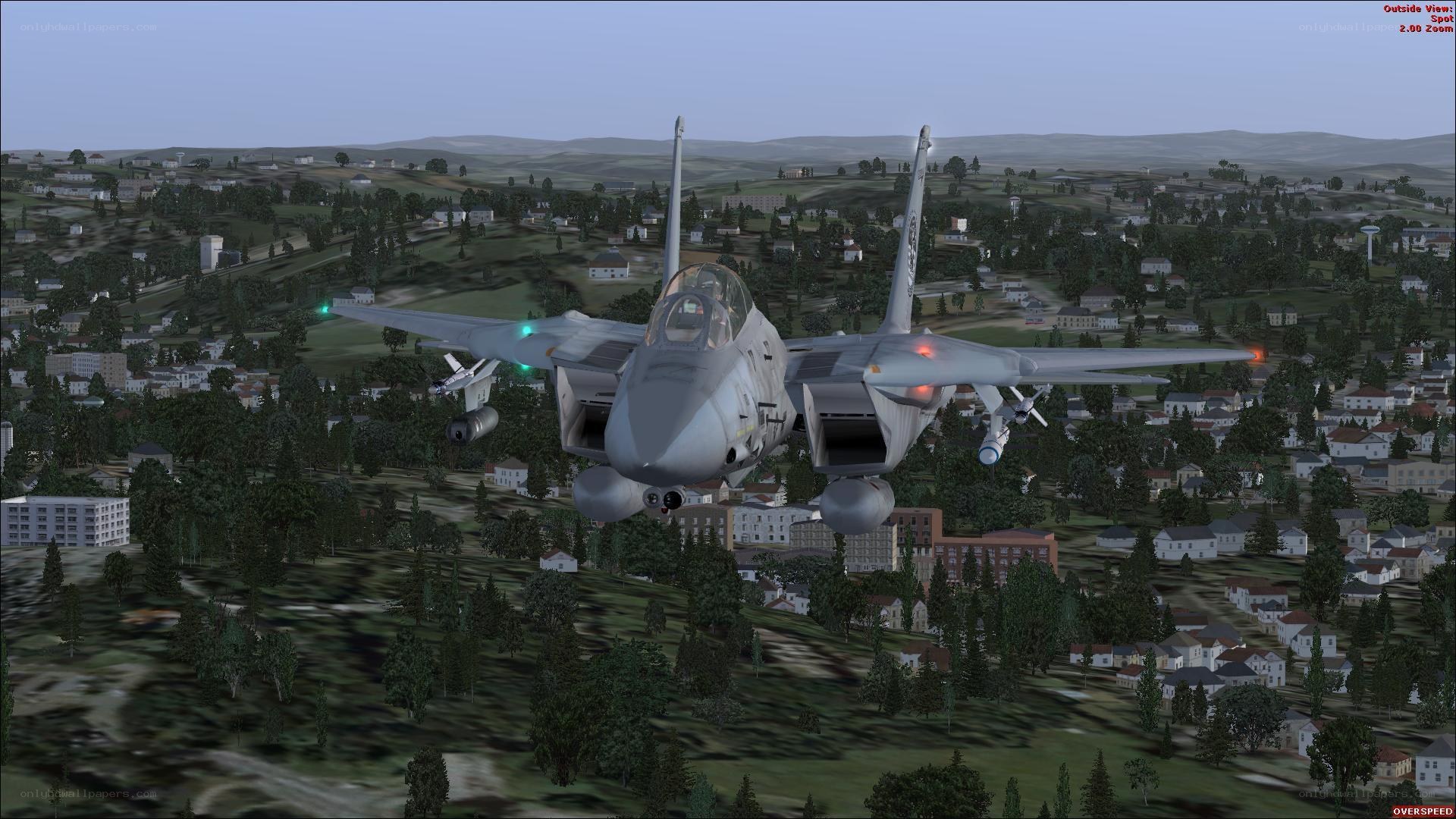 fighter jet over town