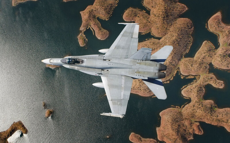 Fighter Jet over Water — Gray
