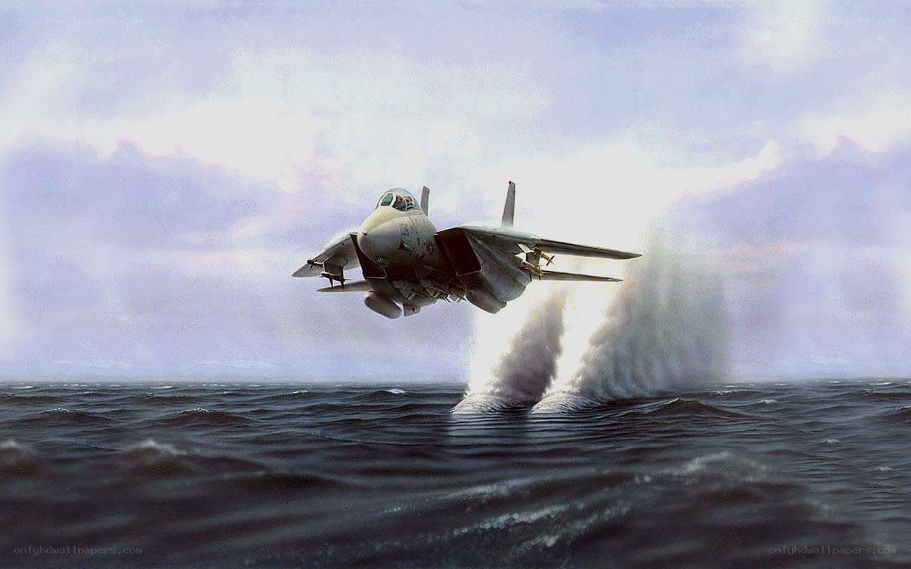 fighter jet taking off from aircraft carrier
