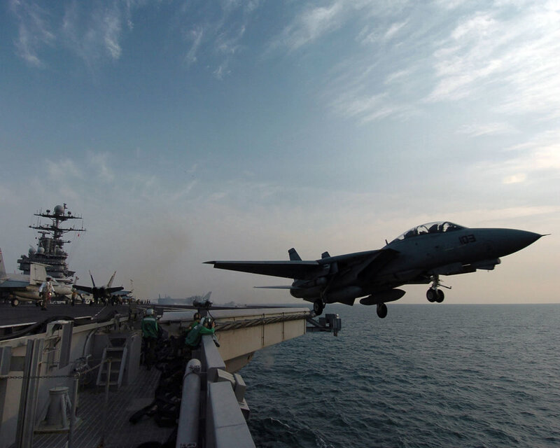 Fighter Jet Taking Off — Gray, Dramatic, Afternoon, Photograph, Aircraft Carrier, Ocean, Crew Members, Blue, White