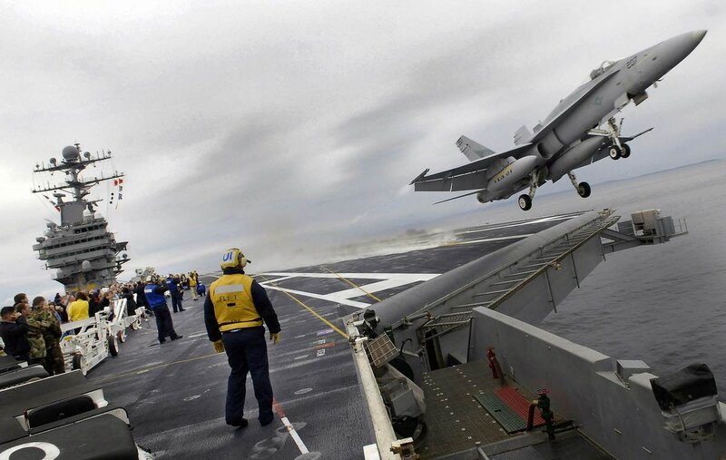 Fighter Jet Taking Off — Gray, Dramatic, Photograph, Aircraft Carrier, Crew Members