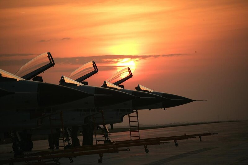 Fighter jets at sunset