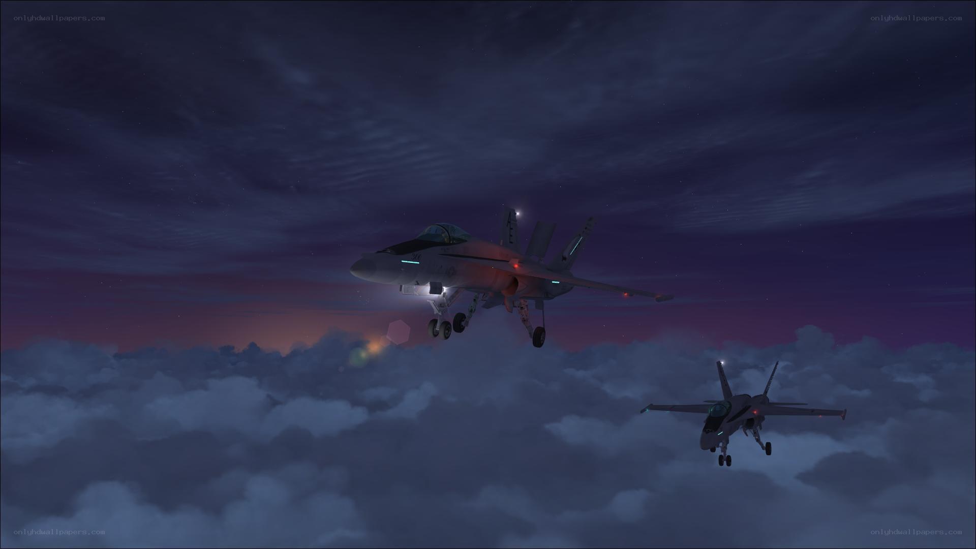 Fighter jets flying over clouds