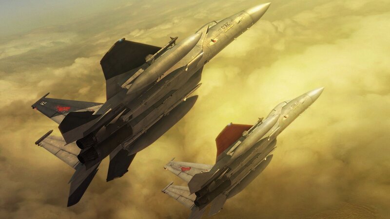 Fighter jets in cloudy sky
