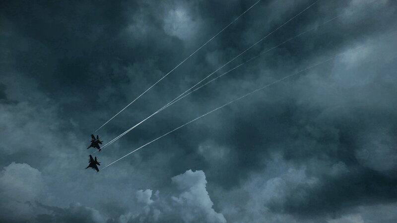Fighter jets in stormy sky