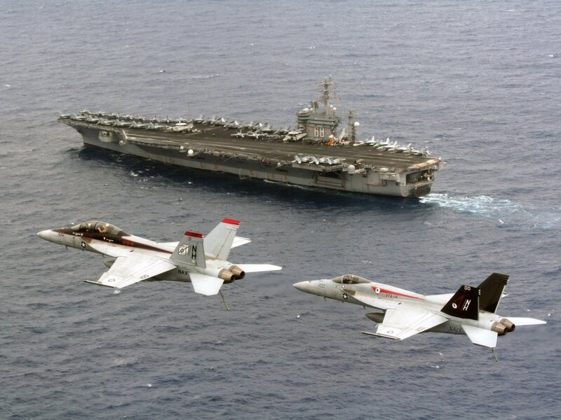 Fighter jets near aircraft carrier