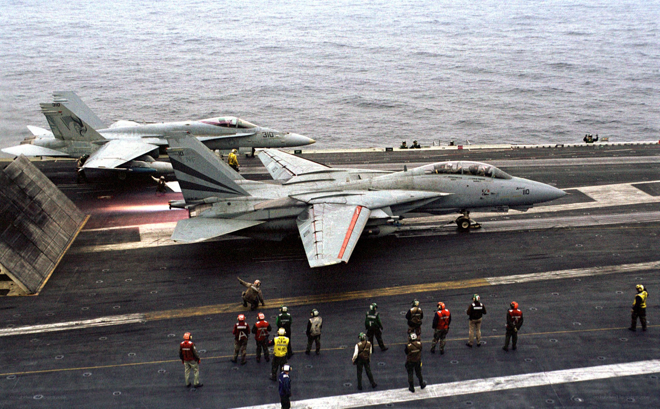 Fighter jets on aircraft carrier deck