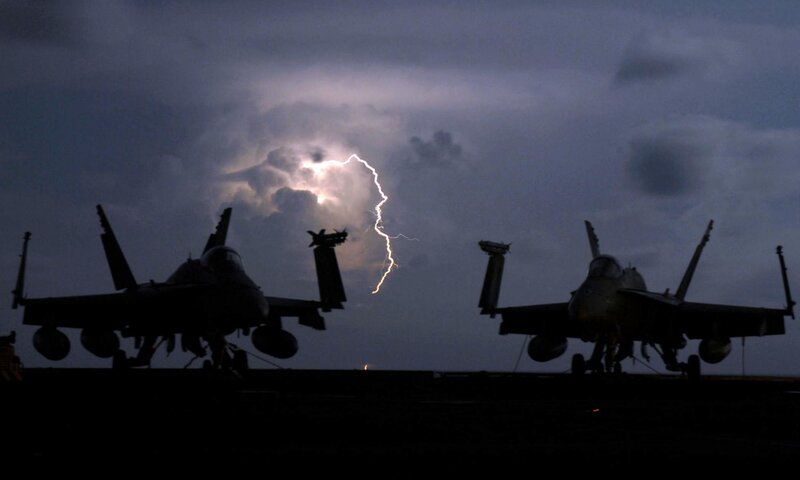 Fighter jets on deck during lightning storm