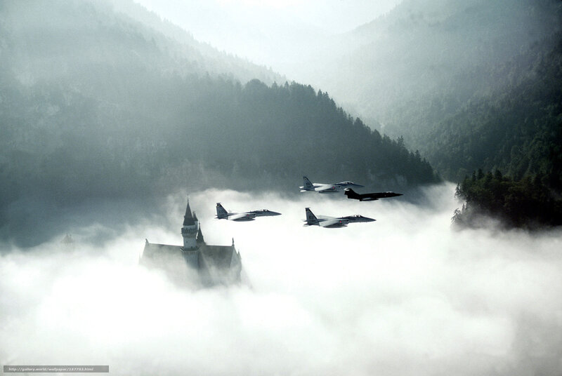 Fighter jets over a castle in clouds