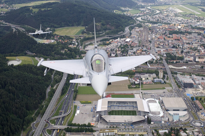 Fighter jets over a city