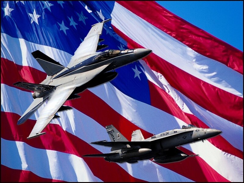 Fighter jets over American flag