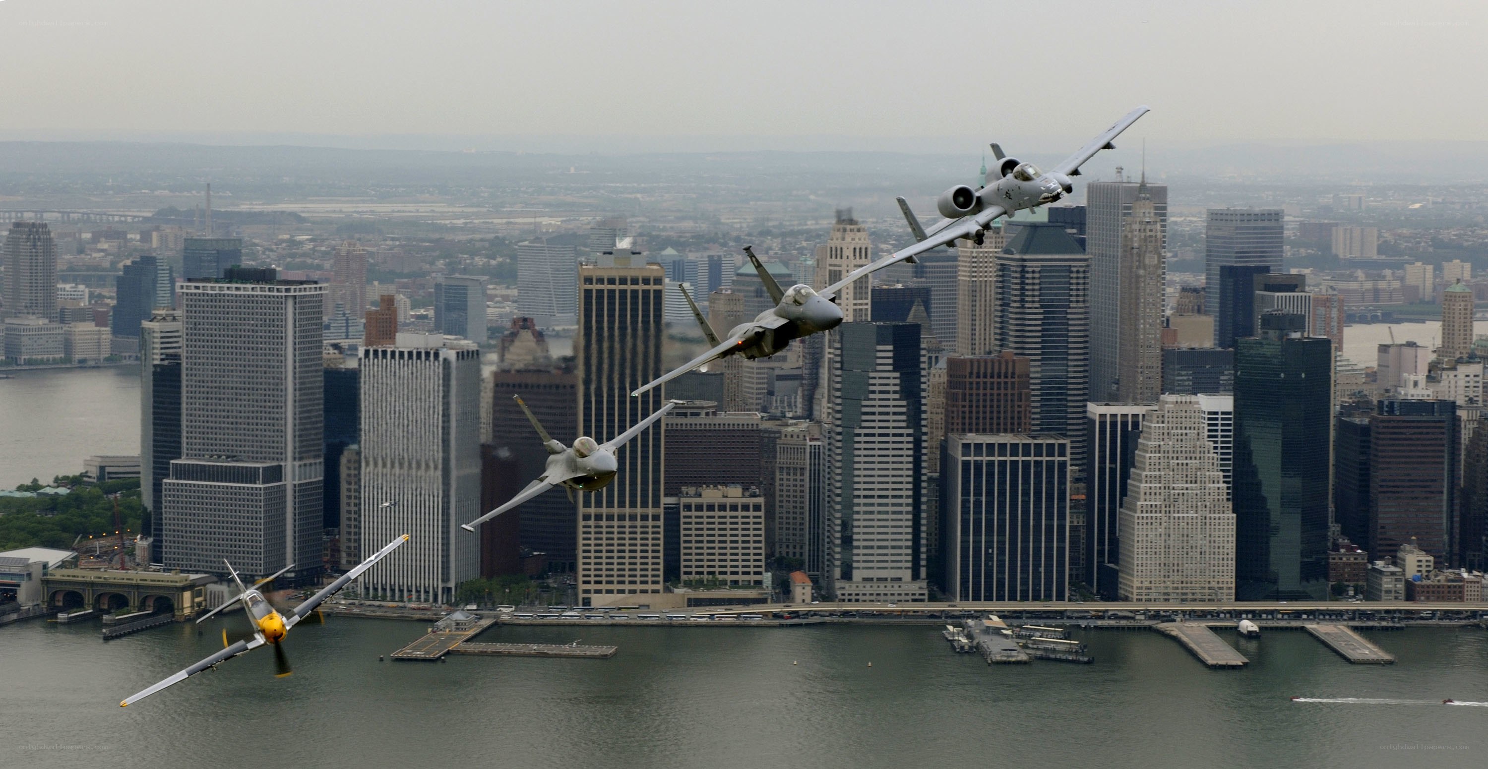Fighter jets over city skyline