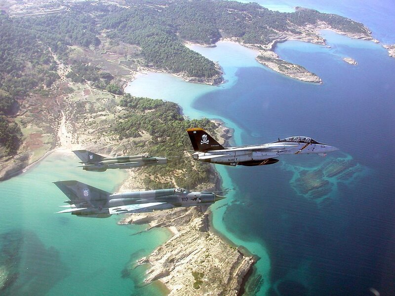 Fighter jets over coastal islands