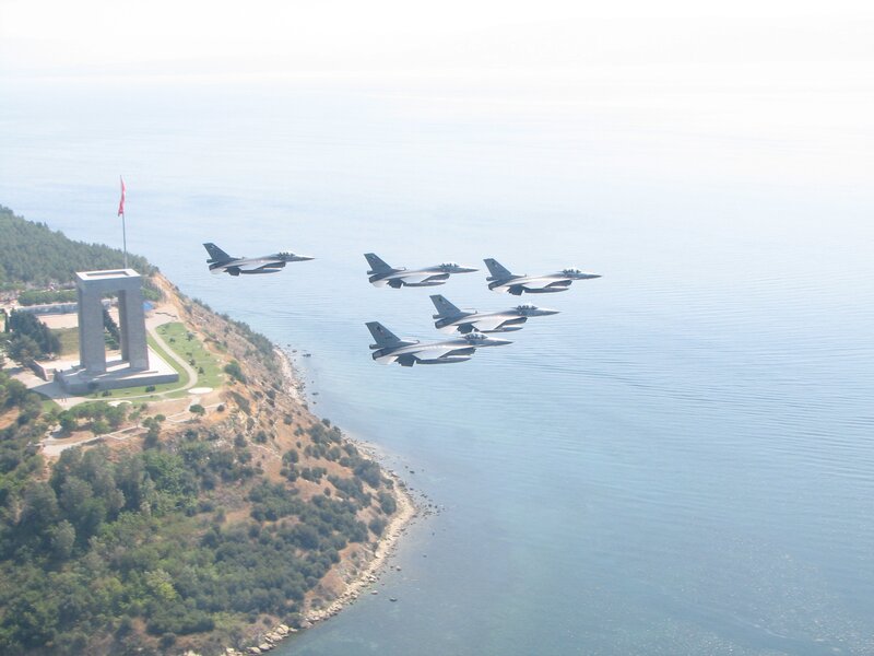 Fighter jets over coastal monument