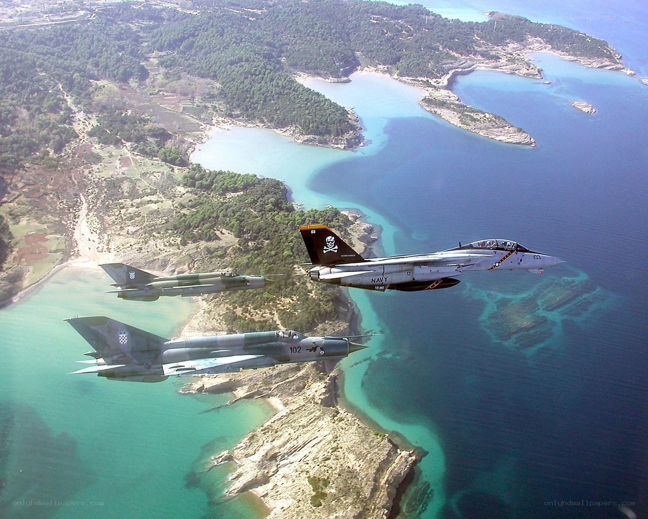 Fighter jets over coastal waters