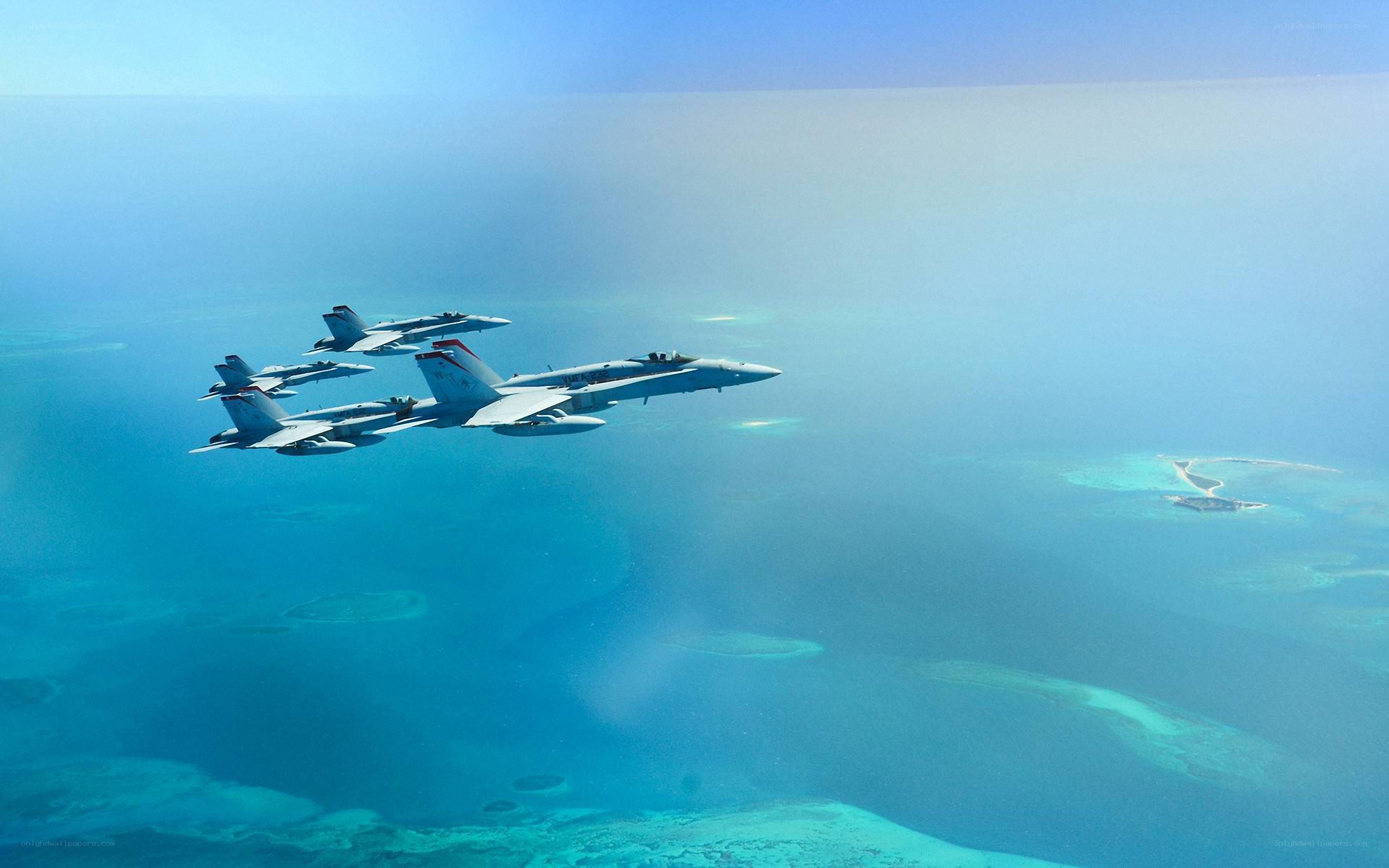 Fighter jets over coral reef