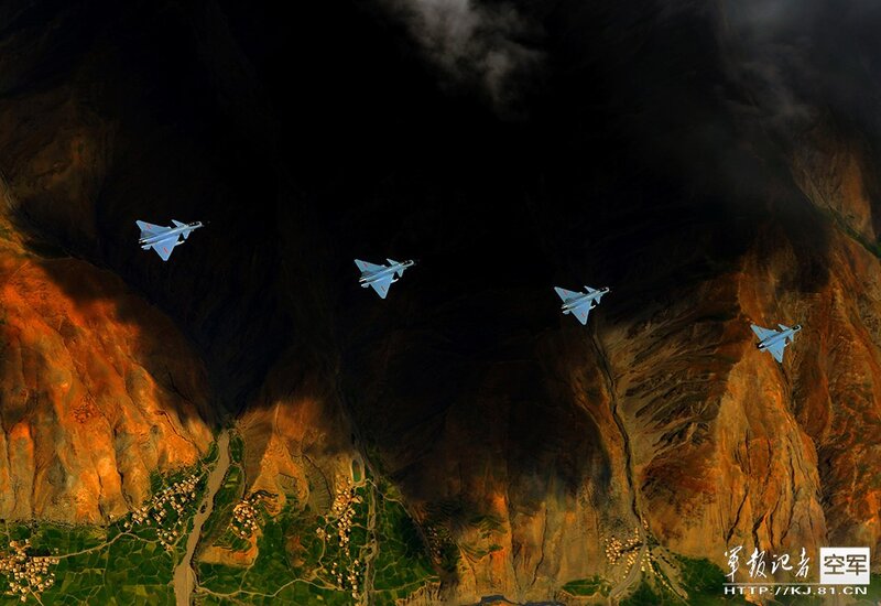 Fighter jets over mountain valley
