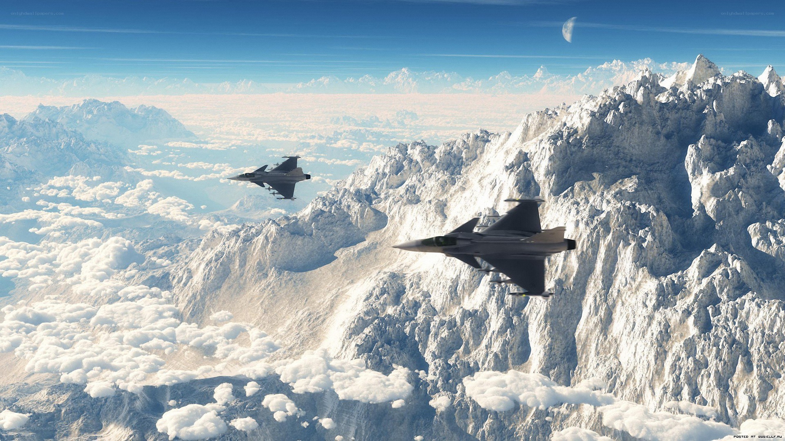 Fighter jets over snowy mountains