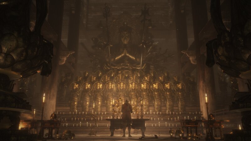 Figure Before Golden Statues — Gold
