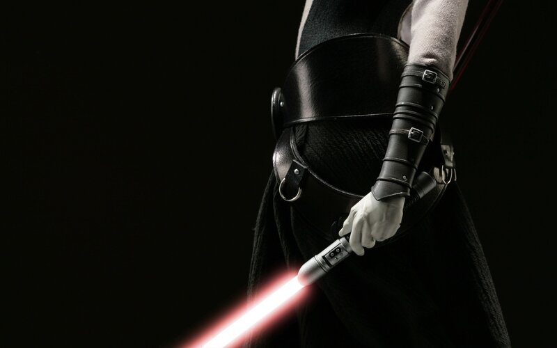 Figure Holding Lightsaber — Black, Dramatic