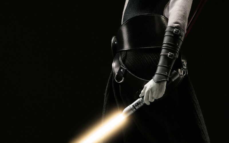 Figure Holding Lightsaber
