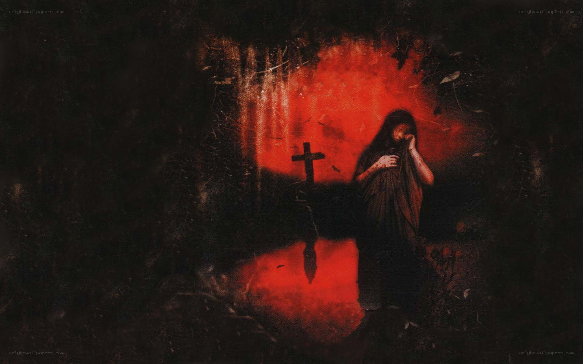 figure in red light with cross