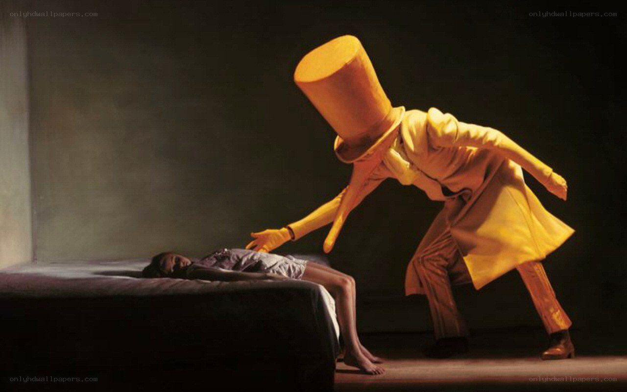 figure in top hat leans over bed