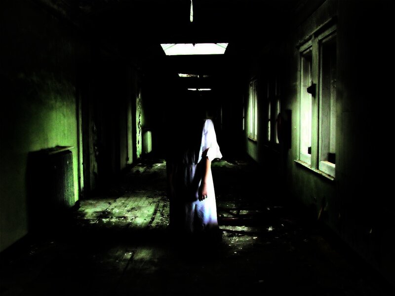 Figure in White Dress