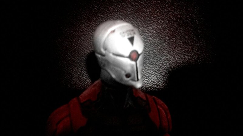 Figure in White Helmet