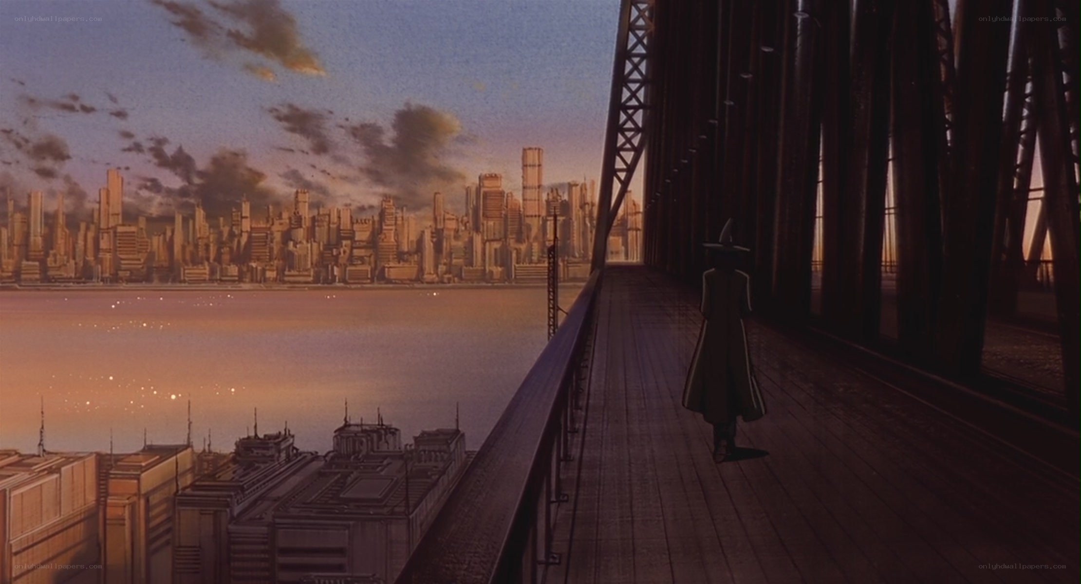 figure on a bridge at dusk